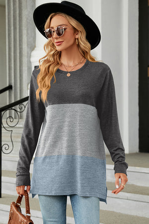 Colorblock long sleeve tee with crew neck and side slits in charcoal, light gray, and cloudy blue.