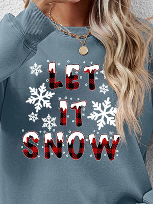 Misty Blue crewneck sweatshirt with "Let It Snow" graphic and snowflakes.