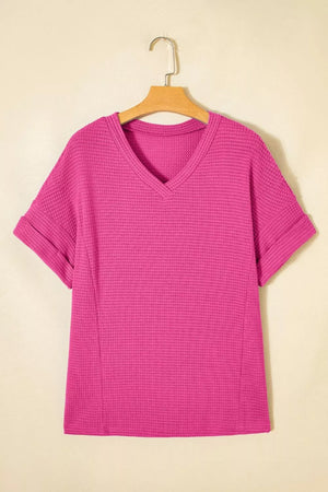 Hot Pink waffle knit V-neck t-shirt with cuffed short sleeves.