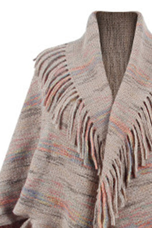 Textured knit cape in Khaki with fringe trim and colorful stripes