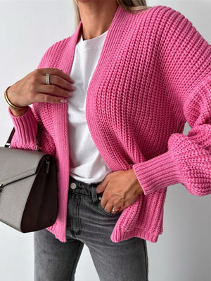 Hot Pink textured puff sleeve cardigan with ribbed cuffs and open front.