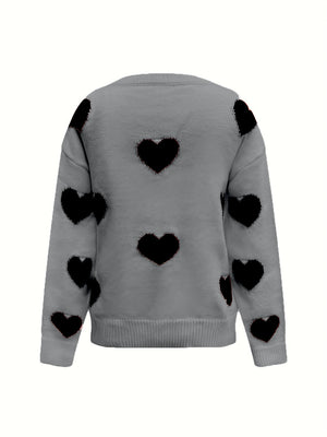 Gray oversized knit crewneck sweater with black heart pattern and drop sleeves.