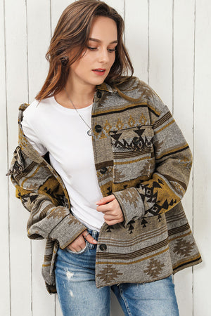 GeoChic collar jacket in camel with tribal pattern and chest pockets.