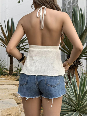 Iridescent shell-embellished halter cami with tie back, cropped knit style.