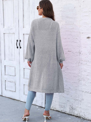 Ribbed knit maxi cardigan in light grey with balloon sleeves and pockets.