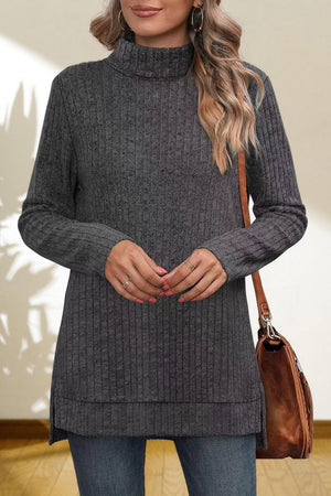 Charcoal ribbed knit turtleneck tunic top with long sleeves and side slits.