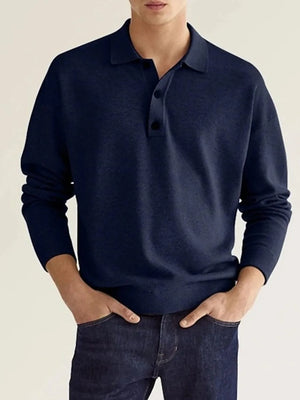 Navy long sleeve knit polo shirt with button placket and relaxed fit.