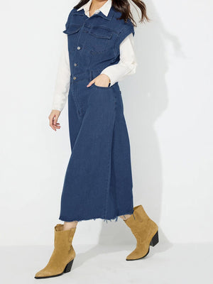 Sleeveless dark wash denim midi dress with button front, pockets, and frayed hem.