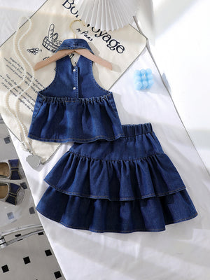 Denim halter top and tiered skirt set with bow accents in dark navy.