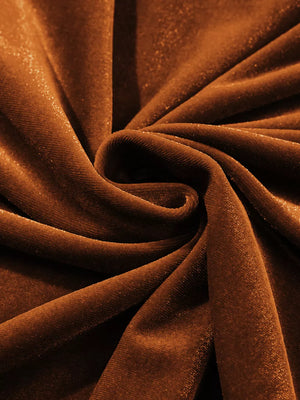 Brown velvet mock neck shirt with subtle shimmer, showing fabric texture.