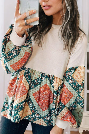 Beige peplum knit tunic with patchwork paisley print sleeves and hem
