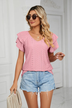 Blush pink eyelet knit v-neck blouse with flutter sleeves and diamond pattern detail.