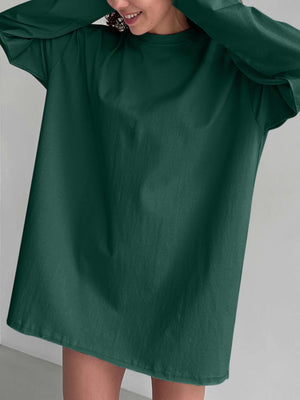 Oversized dark green cotton jersey top with crewneck and long sleeves.