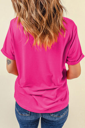 Hot pink t-shirt with rolled sleeves and a casual fit.