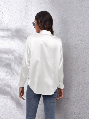 White satin collared button-down shirt with long sleeves, shown from the back.