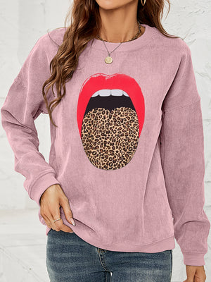 Dusty Pink corduroy crewneck sweatshirt with a red lip and leopard print tongue graphic.