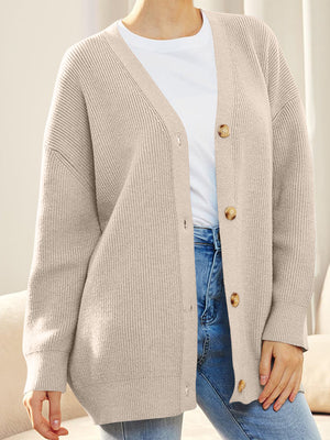 Dust Storm ribbed knit cardigan with balloon sleeves and button front, styled casually.