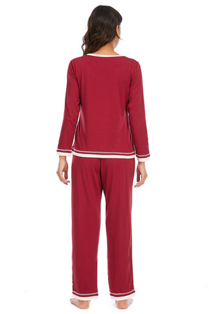 Wine long sleeve pajama set with white trim and contrast stitching.