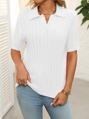 White cable knit polo sweater with short sleeves and collar