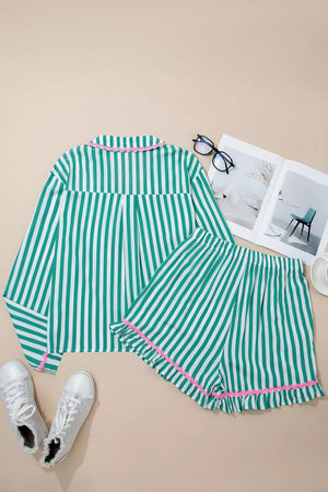 Green and white striped pajama set with pink trim and ruffled shorts.