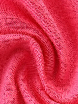 Close-up of pink cotton knit fabric with soft texture