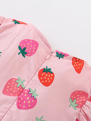 Pink cotton blend baby dress with strawberry print and puff sleeves.