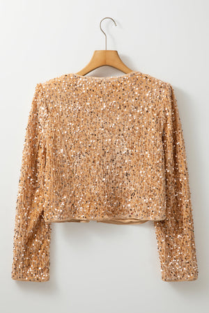 Tan sequin embellished cropped open jacket with long sleeves.