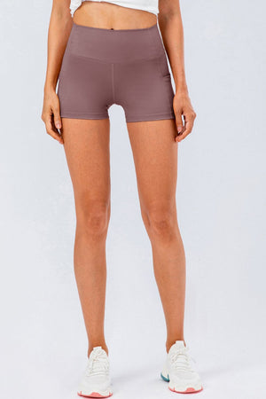 Moonlit Mauve performance shorts with pockets and a v-waistband.