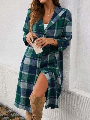Checked plaid hooded duster coat in dark green with button front and side slit.