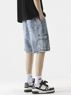 Light wash denim cargo shorts with drawstring waist and multiple pockets.
