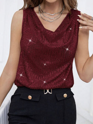 Burgundy sequin tank top with cowl neck and sparkle detail.