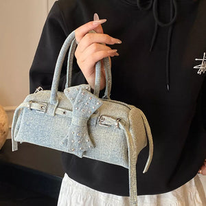 Denim Bow Accent Crossbody Bag in Blue, back view