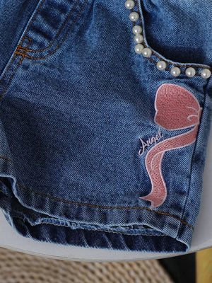 Blue denim shorts with pearl trim and pink bowknot embroidery.