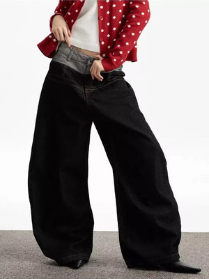 Layered double waist wide leg jeans in dark wash cotton denim with a relaxed fit.