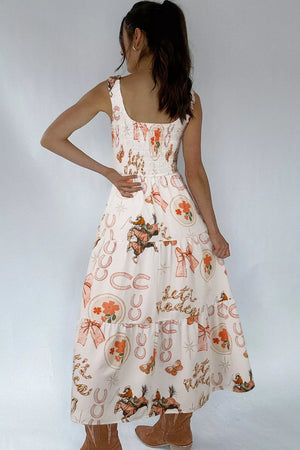 Cowboy print midi dress with U-neck and tiered skirt, cotton blend fabric.