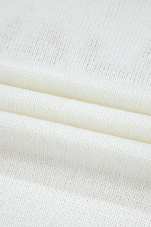 White knit sweater with stitch trim detail