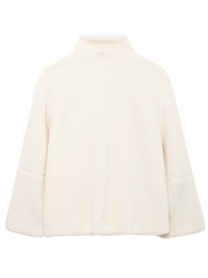White sherpa stand-collar jacket with a relaxed fit and bell sleeves.