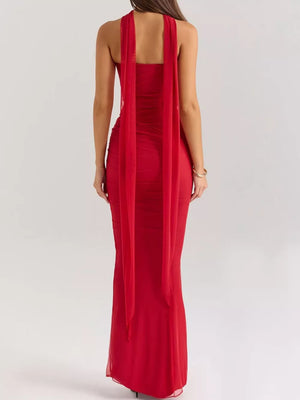 Red sweetheart tube top and flowy maxi skirt set with draped chiffon detail.