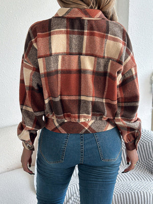 Cropped plaid shacket in terracotta with gathered sleeves and button detail.