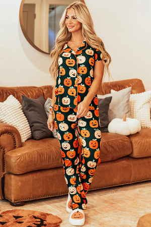 Pumpkin Patch Pajama Set with short sleeves and pants, featuring a dark green base with an all-over pumpkin print.