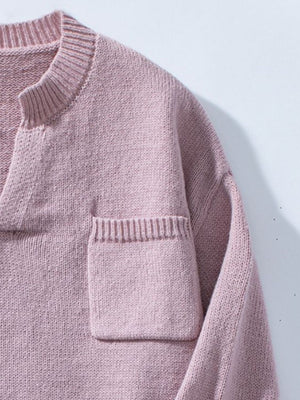 Dusty pink knit sweater with notched neckline and chest pocket.