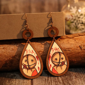 Sam Trick or Treat wood drop earrings with painted character detail and copper hooks.