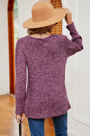 Asymmetric ribbed button-down top in Red-Violet with long sleeves and a crew neckline.