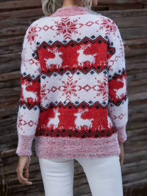 Red and white fuzzy sweater with reindeer and snowflake pattern