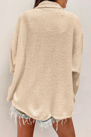 Textured corduroy overshirt in camel with button front and patch pockets, shown from the back.