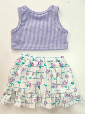 Lavender ribbed tank top and white floral grid print skirt with ruffles.