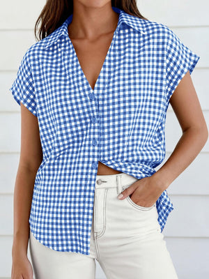 Sky blue gingham print tied button-down shirt with short sleeves and a V-neck.