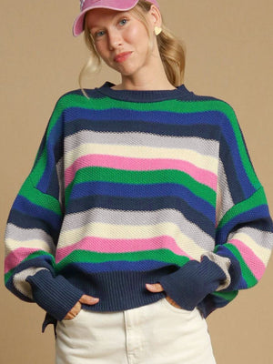 Chunky knit crewneck sweater with colorful horizontal stripes in green, blue, pink, and cream.