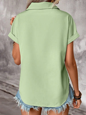 Light Green polyester button-down shirt with cuffed short sleeves and a curved hem.