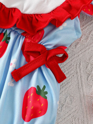 Baby one-piece with strawberry floral print, red ruffles, and bow details.